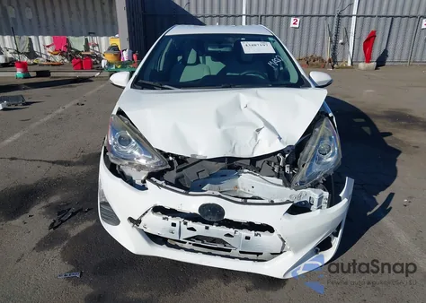 2016 Toyota Prius C One z USA, uszkodzony, nr VIN JTDKDTB34G1126503